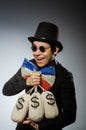 Funny man with money dollar sacks Royalty Free Stock Photo