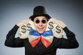 The funny man with money dollar sacks Royalty Free Stock Photo