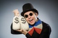 Funny man with money dollar sacks Royalty Free Stock Photo