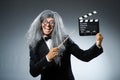 The funny man with movie clapboard