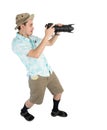 Funny man photographer making picture by camera. Royalty Free Stock Photo