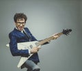 Funny man playing electric guitar Royalty Free Stock Photo