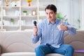 The funny man singing songs in karaoke at home Royalty Free Stock Photo