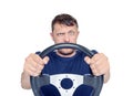 Funny man with a steering wheel isolated on white background, car drive concept