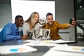 Funny managers, selfie with skeleton in IT office