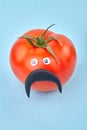 Funny manlike tomato with moustache. Royalty Free Stock Photo