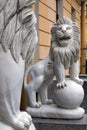 Funny marble smiling lion with ball statue