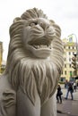 Funny marble smiling lion statue