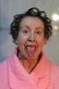 Funny mature lady with curlers Royalty Free Stock Photo