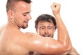 Funny men looking at biceps Royalty Free Stock Photo