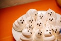 Funny meringue ghosts for Halloween party