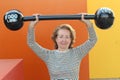 Funny middle aged woman lifting 100 pounds Royalty Free Stock Photo