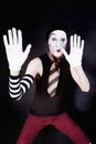 Funny mime on a black background Royalty Free Stock Photo