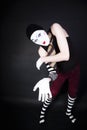 Funny mime in white gloves Royalty Free Stock Photo