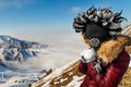 Funny mohawk hat woman in mountains traveling