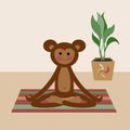 funny monkey doing yoga and sitting in the lotus position