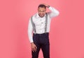 Funny nerd. Crazy freak guy. Portrait of funny funky crazy man with suspenders feel candid face expression shout wear Royalty Free Stock Photo