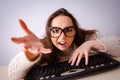 The funny nerd girl working on computer Royalty Free Stock Photo