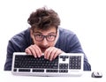 Funny nerd man working on computer isolated on white Royalty Free Stock Photo