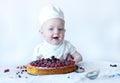 Funny newborn confectioner. Royalty Free Stock Photo