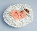 Funny newborn girl with headband