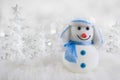 Funny original snowman on abstract winter ice trees background Royalty Free Stock Photo