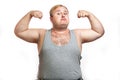 Funny overweight sports man flexing his muscle isolated on white background