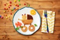 Funny pancakes for kids breakfast on wooden table Royalty Free Stock Photo