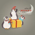 Funny penguins friends celebrating Christmas