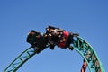 Funny people enjoying a spin in Cobra`s Hunt Roller Coaster Tampa Bay aBush Gardens Tampa Bay.