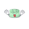 Funny pistachio macaron mascot design with Tongue out