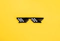 Funny pixelated boss sunglasses on yellow background. Gangster, Black thug life meme glasses . Pixel 8bit style