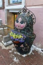 Russia, St. Petersburg, January 2022. Russian nesting doll at the door to the store.