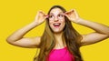 Funny portrait of excited girl wearing glasses eyewear. Closeup portrait of young woman making funny face expression on