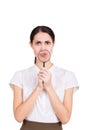 Funny portrait of girl holding magnifier near her face. Isolated