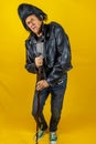 Funny portrait of mature rocker. An old singer dressed in rockabilly style in action Royalty Free Stock Photo