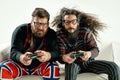 Funny portrait of two best friends playing games Royalty Free Stock Photo