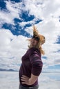 Senior adult woman strikes a pose wearing a goofy straw hat at Bonneville Salt Flats Royalty Free Stock Photo