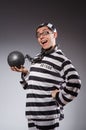 Funny prisoner in chains on gray Royalty Free Stock Photo