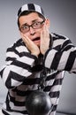 Funny prisoner in chains on gray Royalty Free Stock Photo