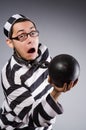 Funny prisoner in chains isolated on gray Royalty Free Stock Photo