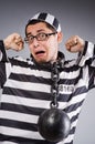 Funny prisoner in chains isolated on gray Royalty Free Stock Photo