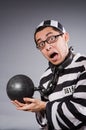 Funny prisoner in chains isolated on gray Royalty Free Stock Photo