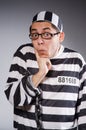 Funny prisoner in chains isolated on gray Royalty Free Stock Photo