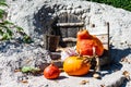 Funny pumpkin figure carving a pumpkin - Halloween concept