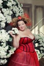 Funny Queen in red dress Royalty Free Stock Photo