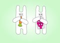 Funny rabbits with carrot and gift