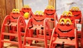 Funny red children`s chairs in a cafe