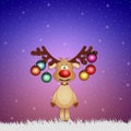 Funny reindeer with Christmas balls Royalty Free Stock Photo