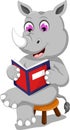 Funny rhino cartoon sitting with reading book